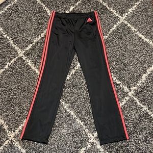 Adidas pants never work black and hot pink/coral  on the side with pockets
